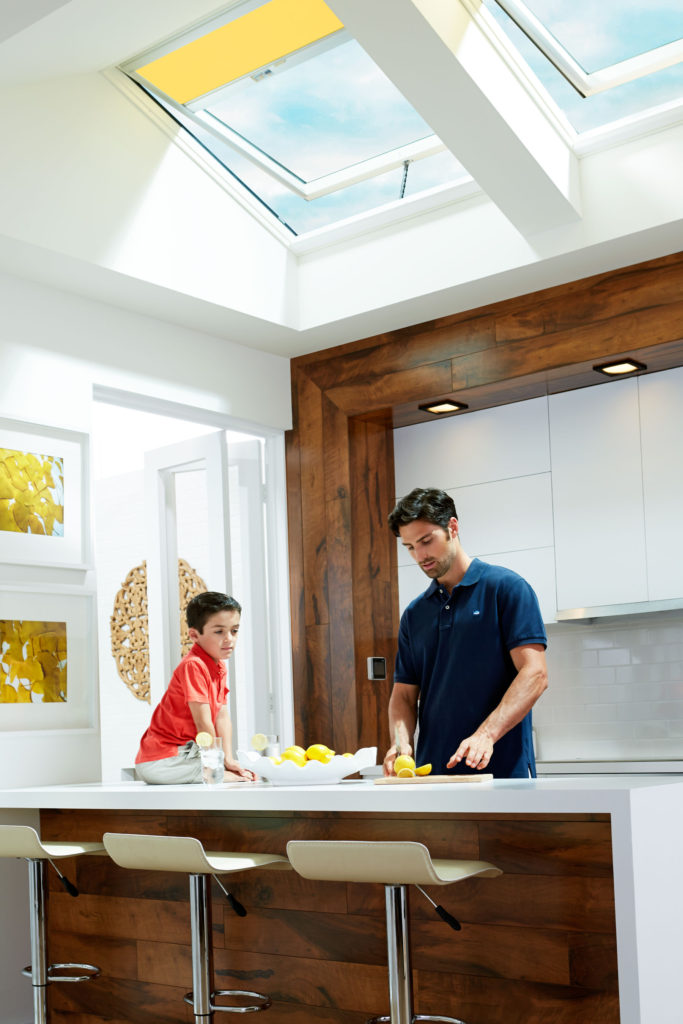 yellow blinds skylights over kitchen