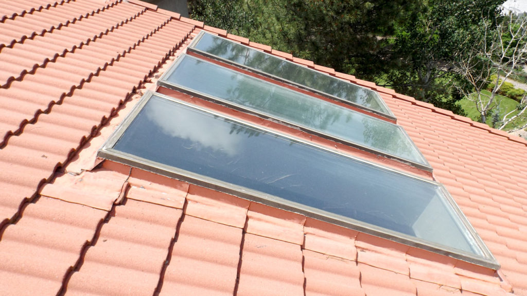 Old skylights on tile roof