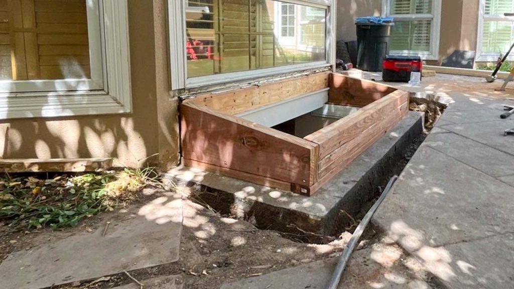 The finished curb sits on top of the concrete.