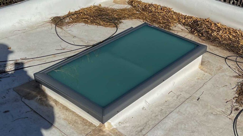 An image of a 2 foot by 4 foot replacement glass skylight on the roof.