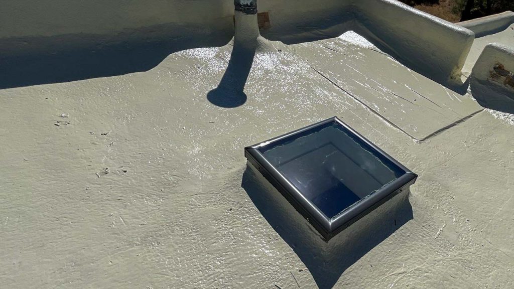 An image of a 2x2 glass skylight replacement on the roof.