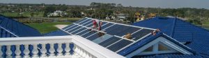 An image of technicians working on the Burnett residebce skylight.