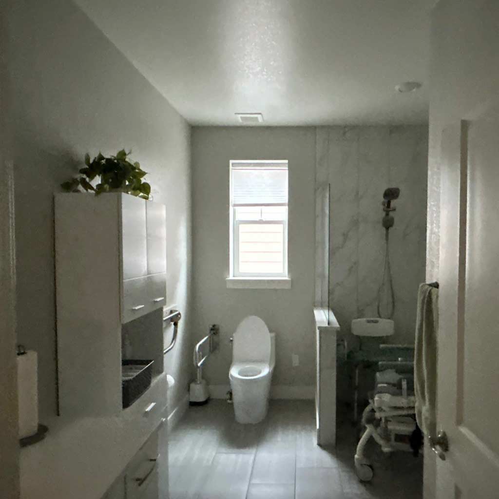 Looking through a door into a bathroom without a Sun Tunnel.