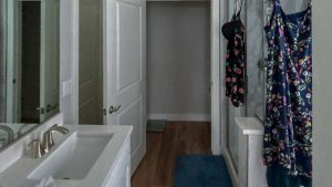 Looking through a door into a bathroom without a Sun Tunnel.