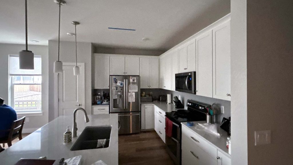 Aview of a kitchen without a Velux skylight.